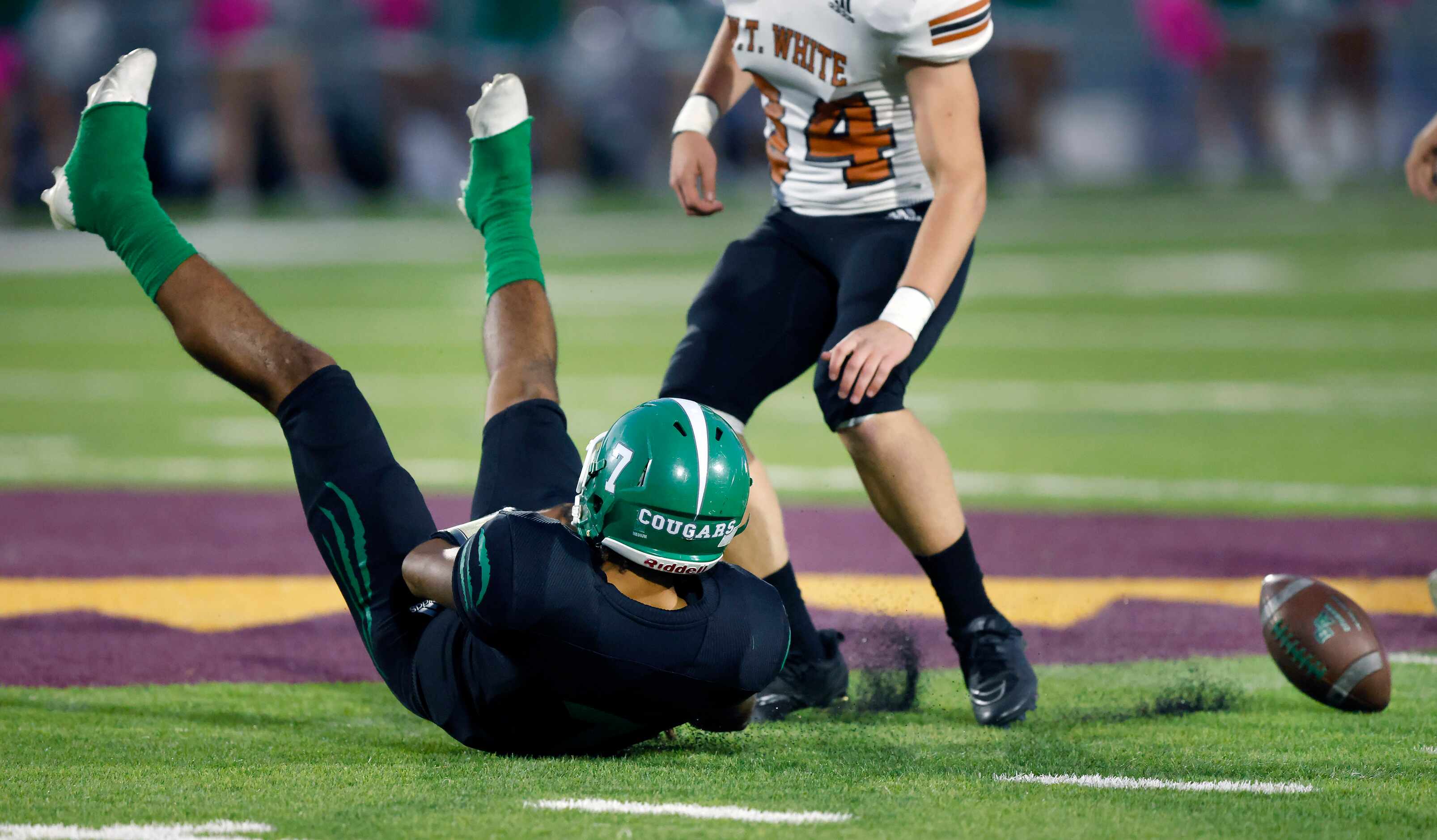 Bryan Adams quarterback Rayvon Jackson Jr (7) tries to corral a fumble before W.T. White...