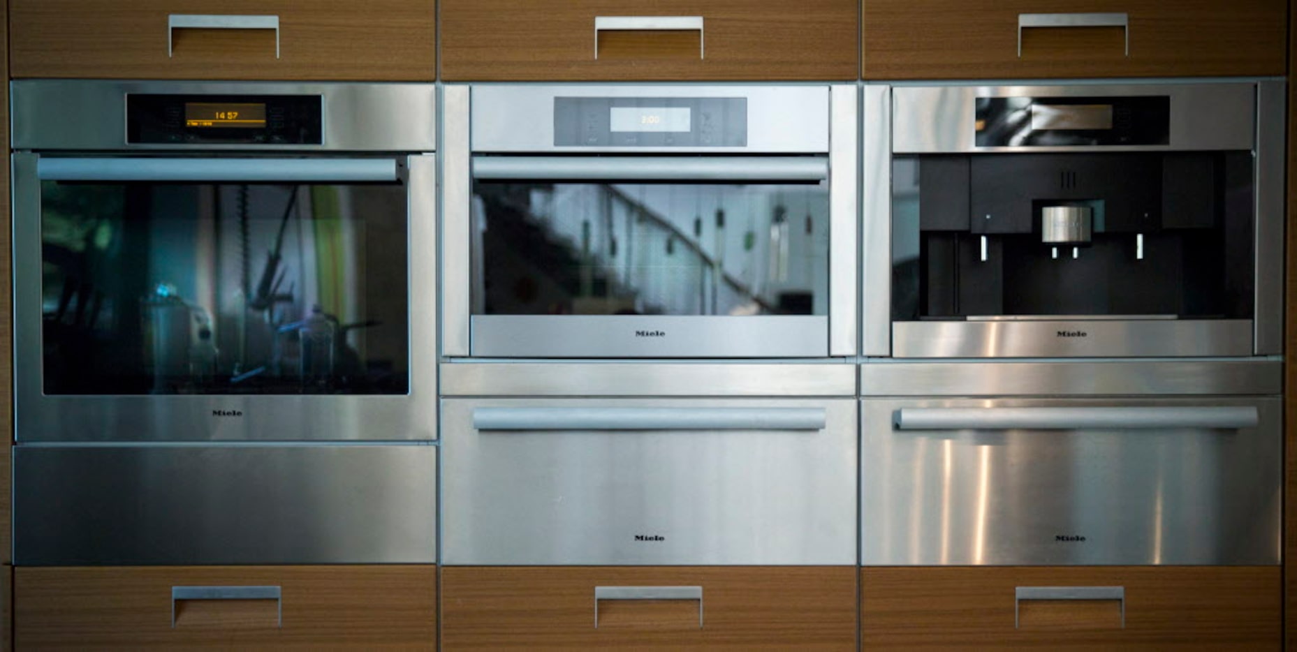 Kitchen appliances and storage line a wall in chef Kent Rathbun's home kitchen Wednesday,...