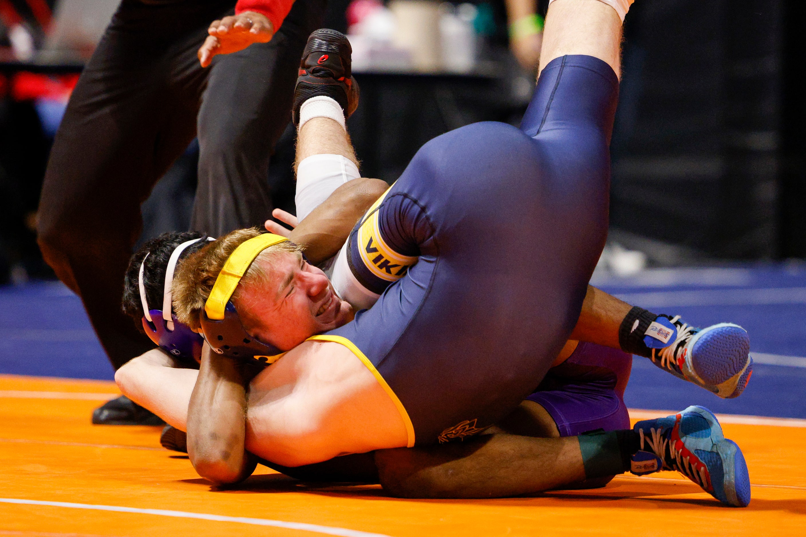 Kyle Lairson of Arlington Lamar wrestles Talim Hussain of Klein Cain during a second round...