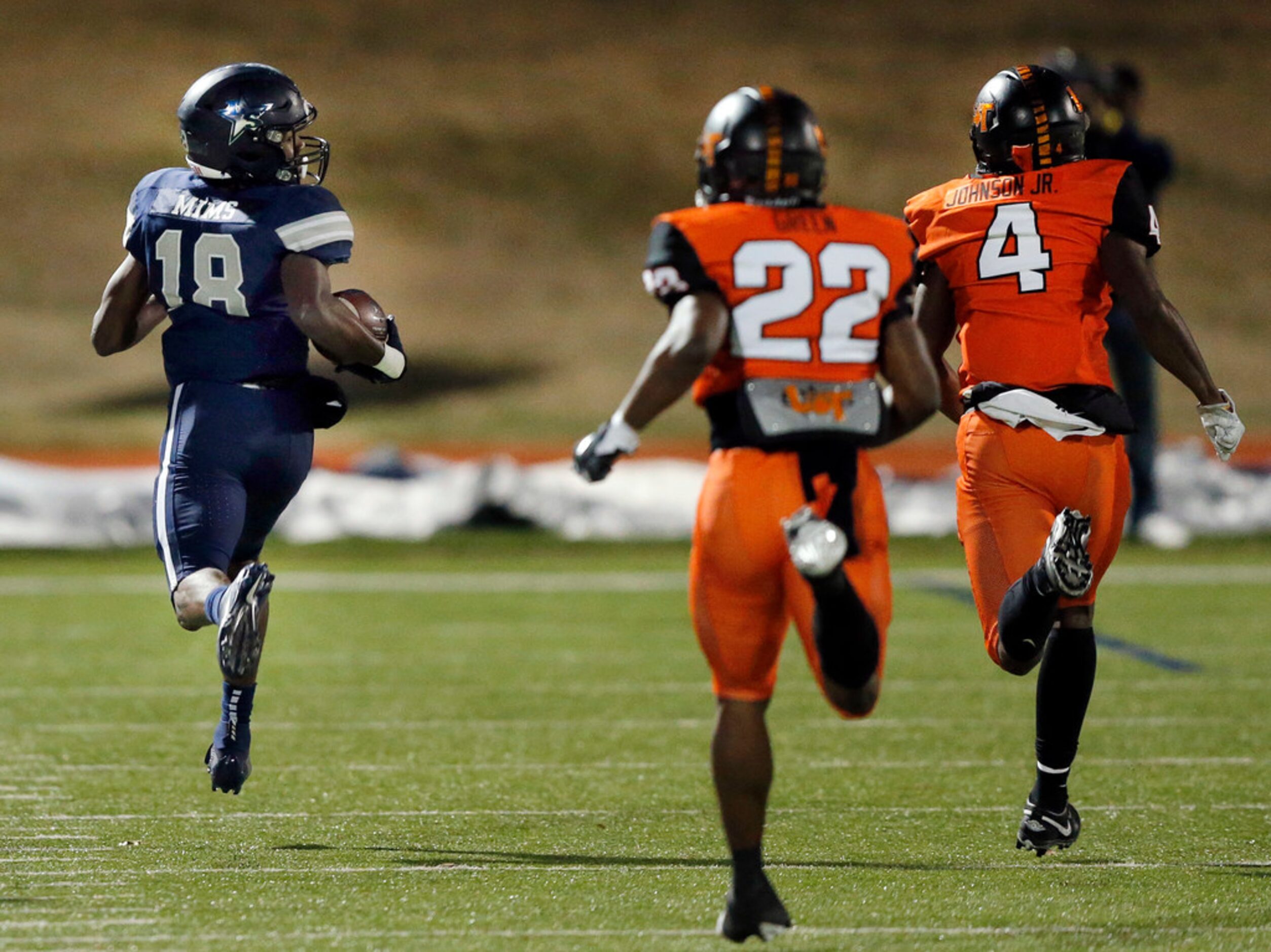 Frisco Lone Star wide receiver Marvin Mims (8) looks back over this shoulder at Lancaster...