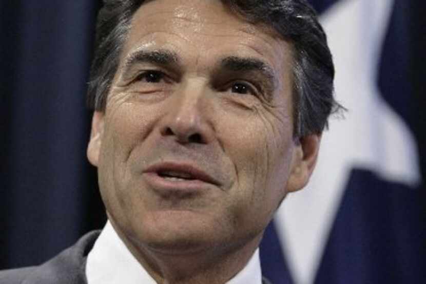 
Rick Perry, speaking at Iowa Freedom Summit, drew applause when he declared: “If Washington...