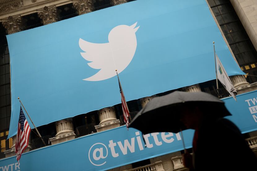 A banner with the logo of Twitter is set on the front of the New York Stock Exchange (NYSE)...
