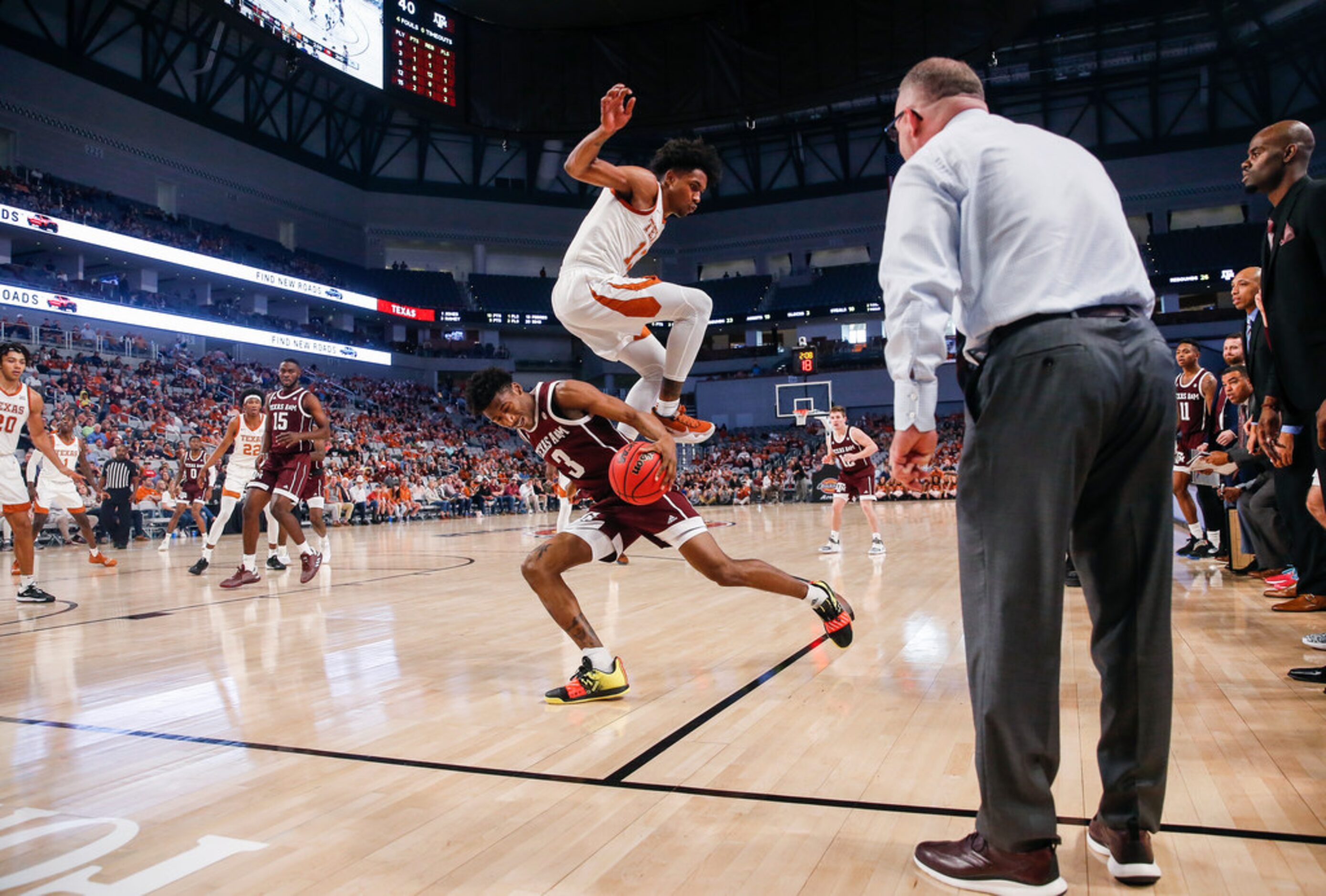 Texas A&M Aggies head coach Buzz Williams works the baseline as Texas A&M Aggies guard...