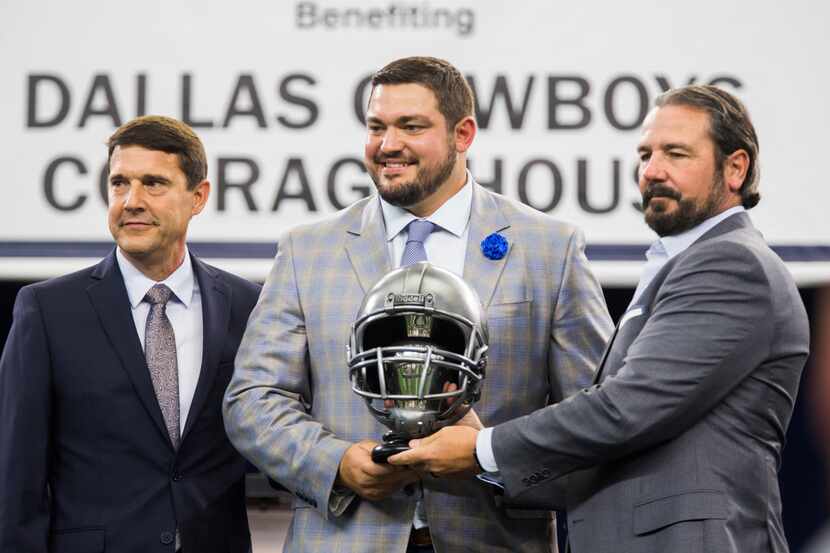 Dallas Cowboys offensive guard Zack Martin (70) receives the Ed Block Courage Award during...