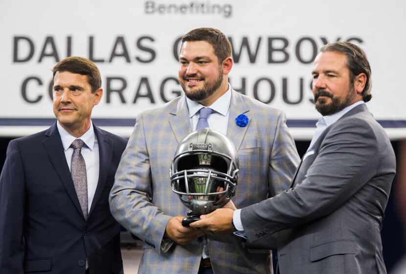 Dallas Cowboys offensive guard Zack Martin (70) receives the Ed Block Courage Award during...