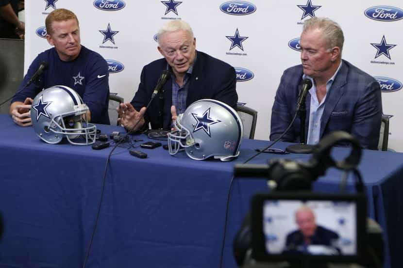 Dallas Cowboys head coach Jason Garrett, left, Cowboys owner and general manager Jerry...