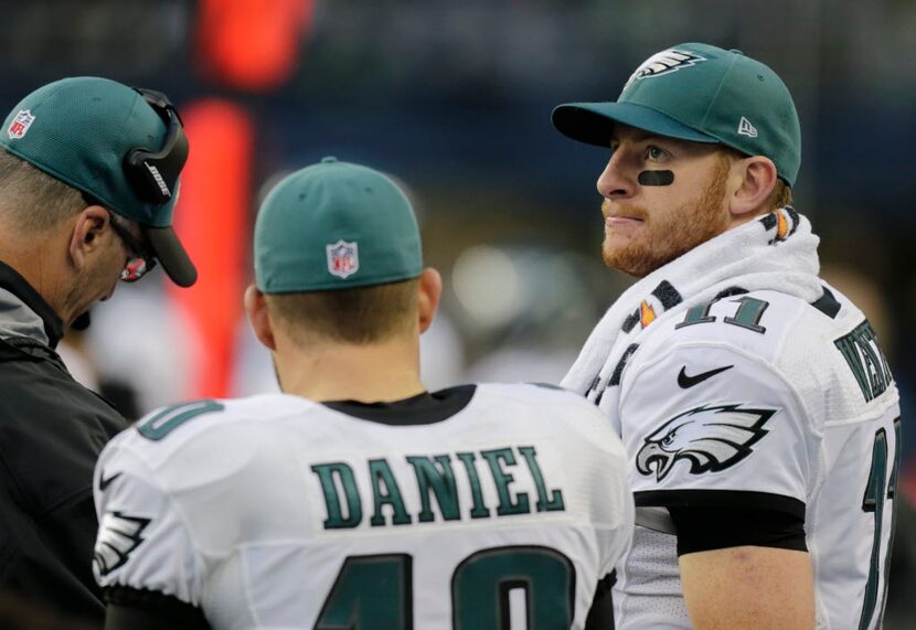 Philadelphia Eagles quarterback Carson Wentz, right, stands with backup quarterback Chase...