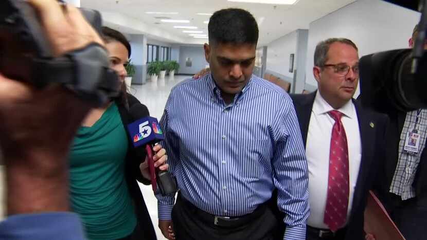 Wesley Mathews, adoptive father of Sherin Mathews, ignores questions as he leaves a court...