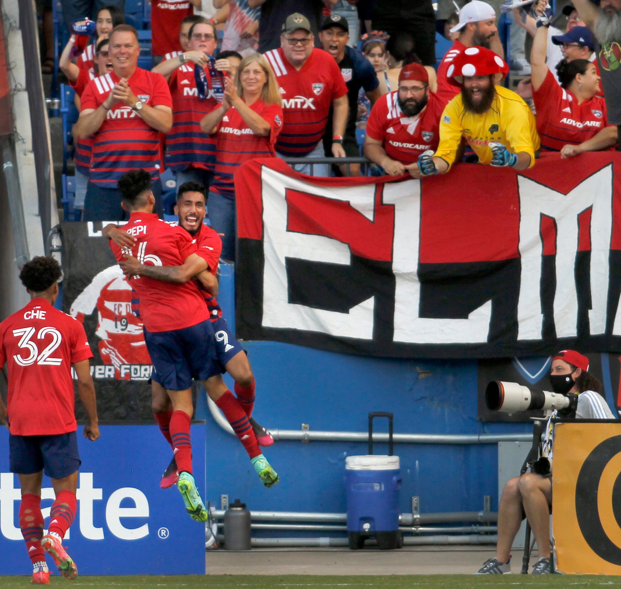 FC Dallas forward Ricardo Pepi (16) back to camera receives a celebratory flying hug from...