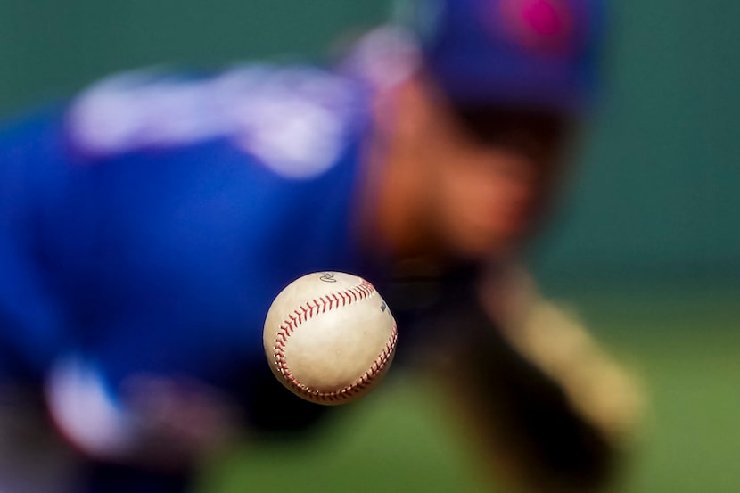 Texas Rangers pitcher Jack Leiter delivers during the sixth inning of a spring training game...