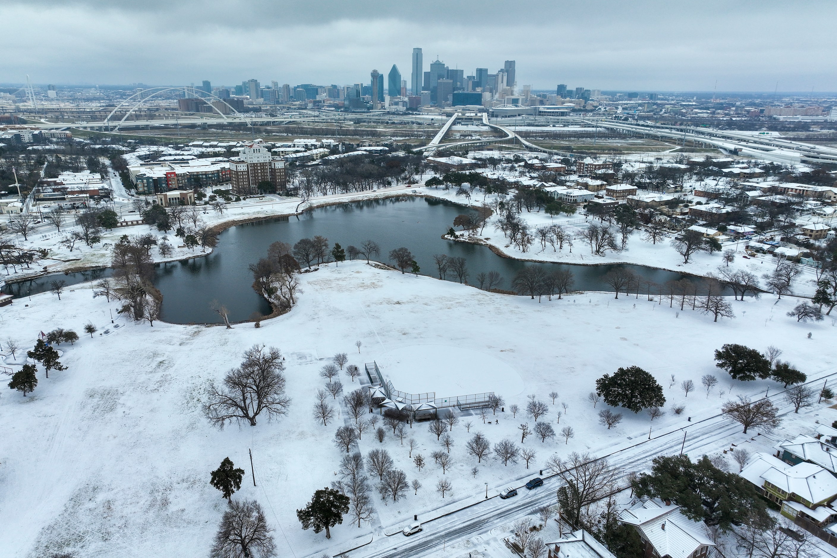 An icy mix covers Lake Cliff Park on Tuesday, Jan. 31, 2023, at Dallas.  Dallas and other...