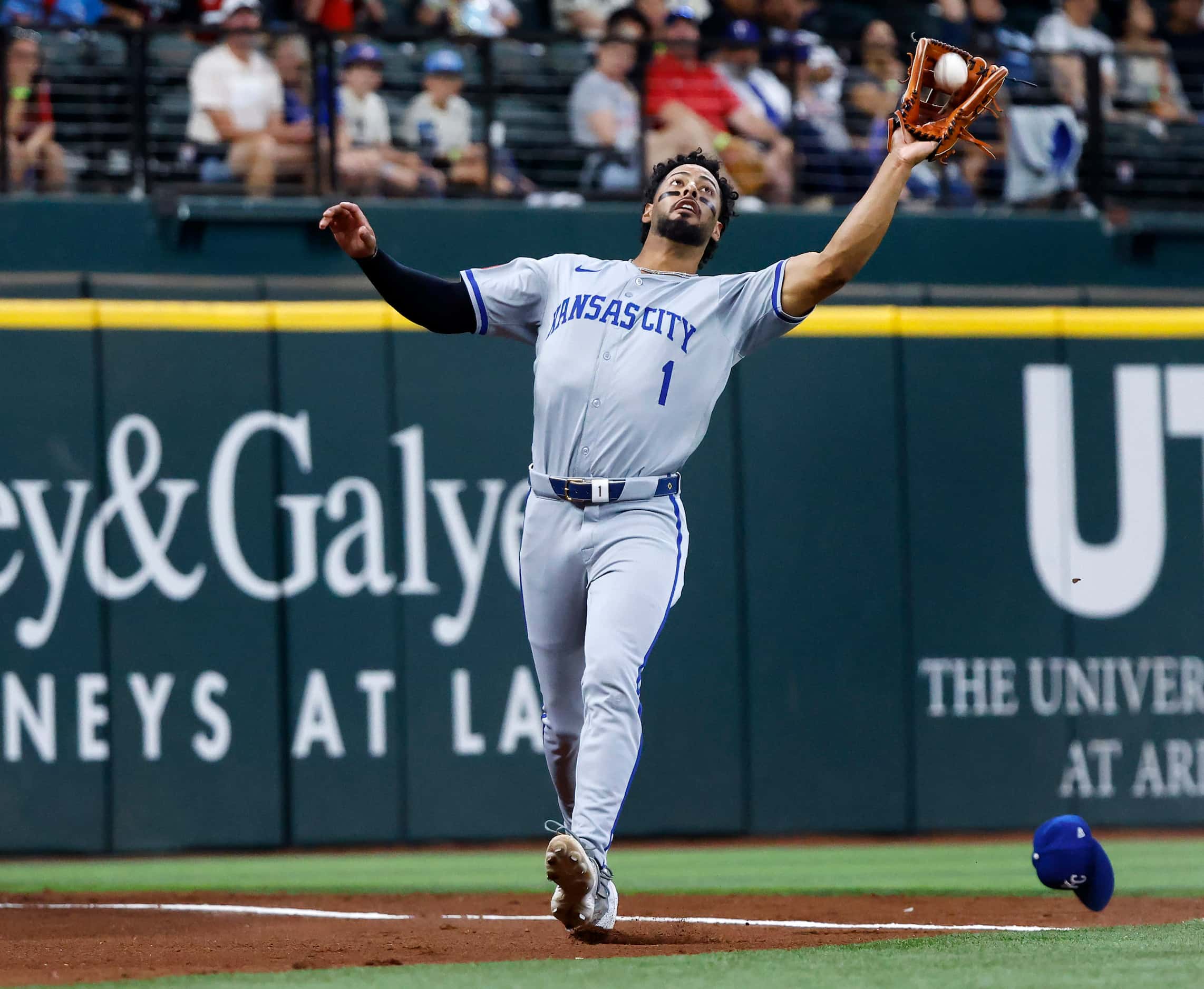 Kansas City Royals outfielder MJ Melendez (1) makes a running catch of a ball hit by Texas...