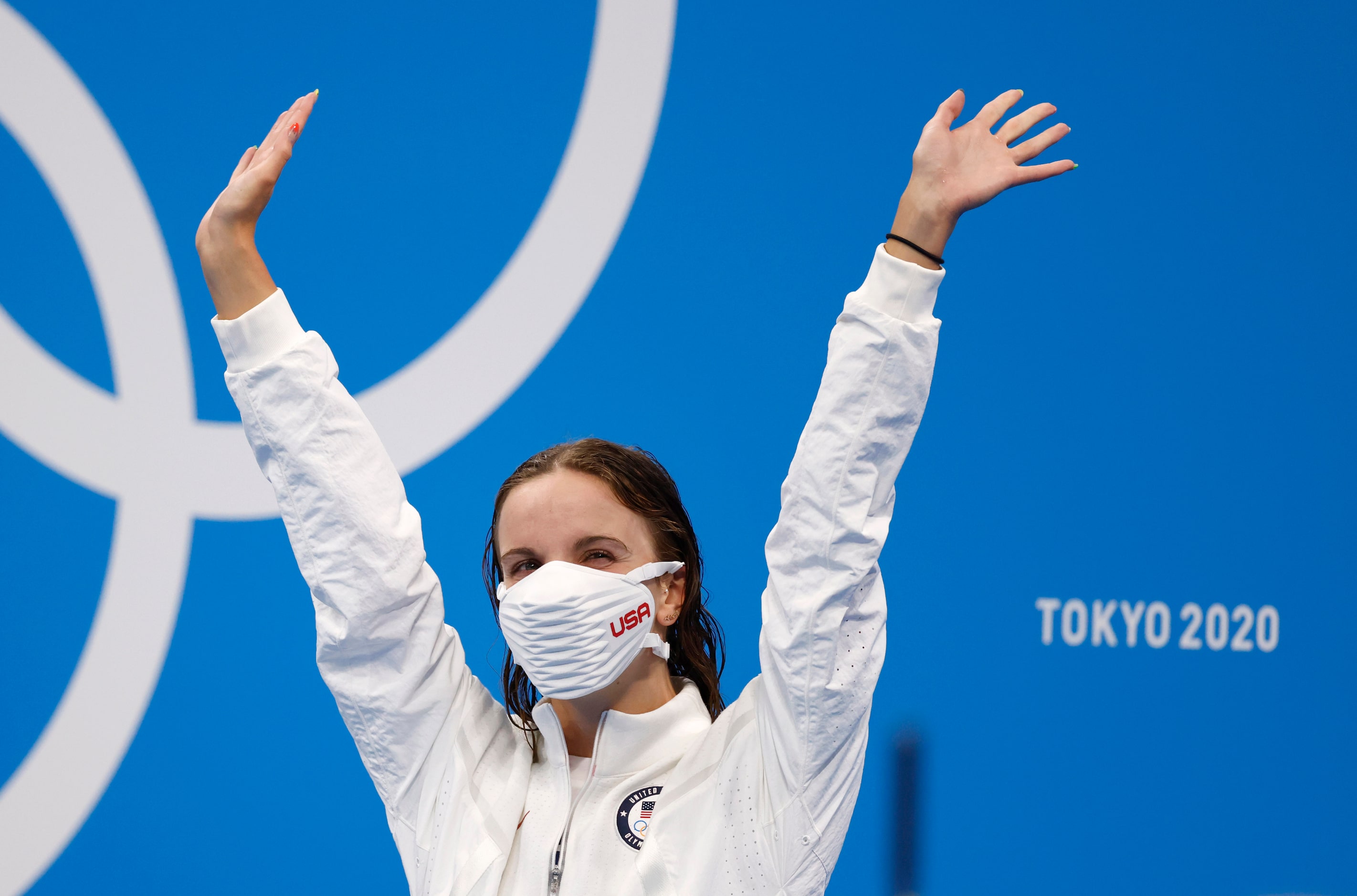 USA’s Regan Smith waves during the medal ceremony for the women’s 100 meter backstroke...