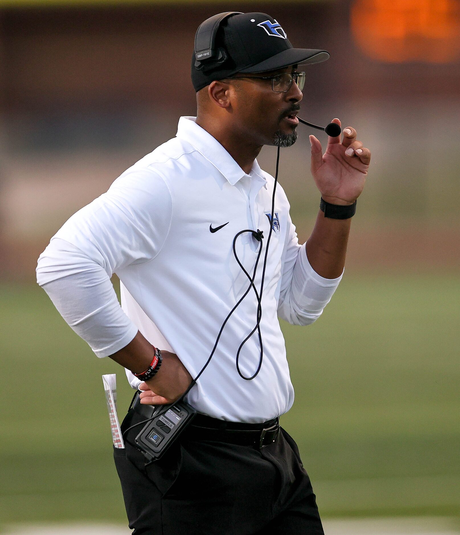 Hebron head coach John Towels III looks on from the sideline during the game against Eaton...