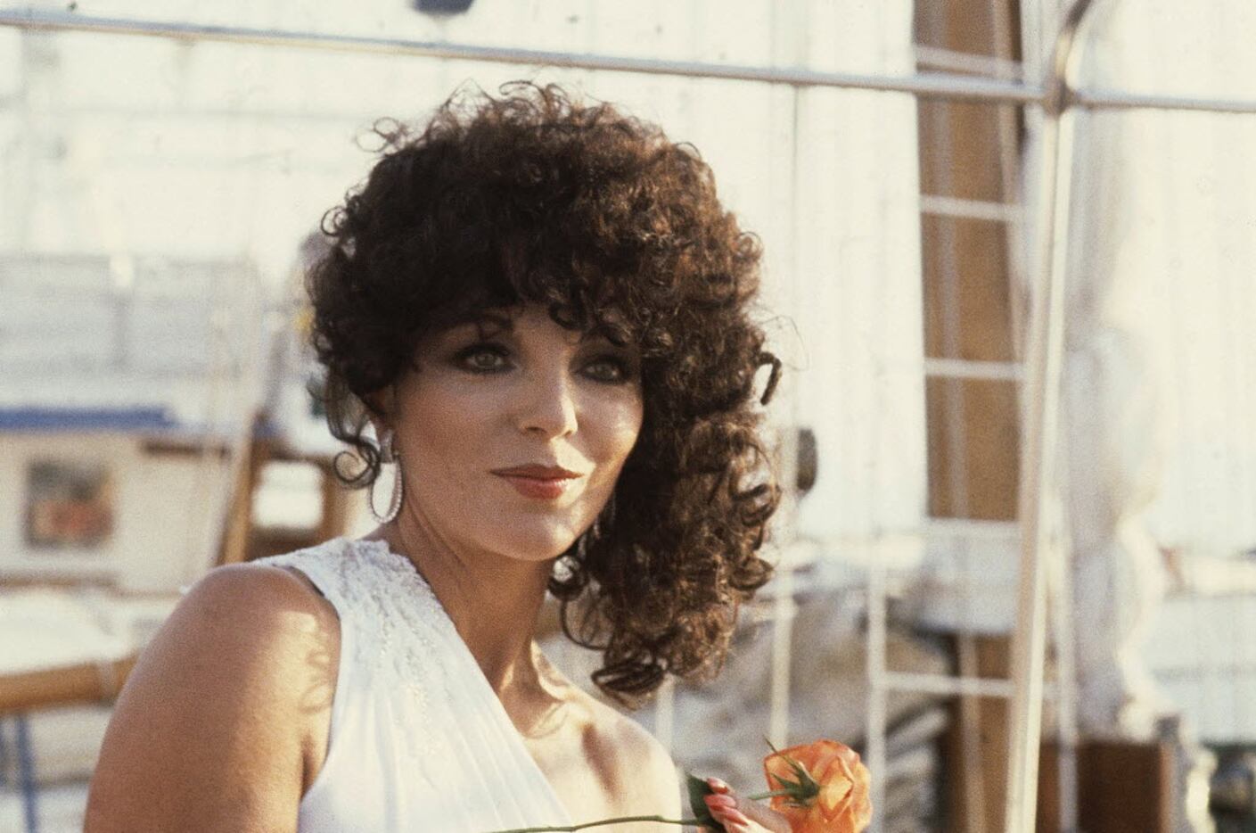 No doubt about it, British actress Joan Collins' curly tresses are not natural.