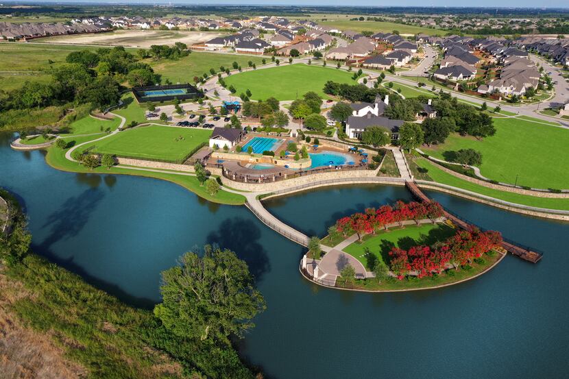 Award-winning Mustang Lakes in Celina features winding, landscaped boulevards leading to...