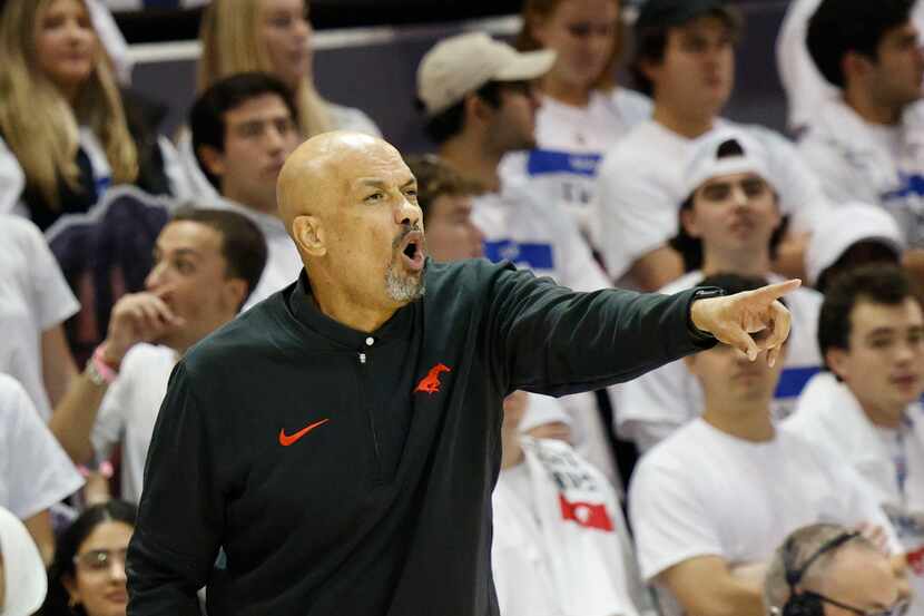 SMU head coach Rob Lanier gestures during the second half of an NCAA college basketball game...