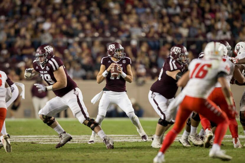 Texas A&M quarterback Nick Starkel (17) looks to pass downfield against New Mexico during...