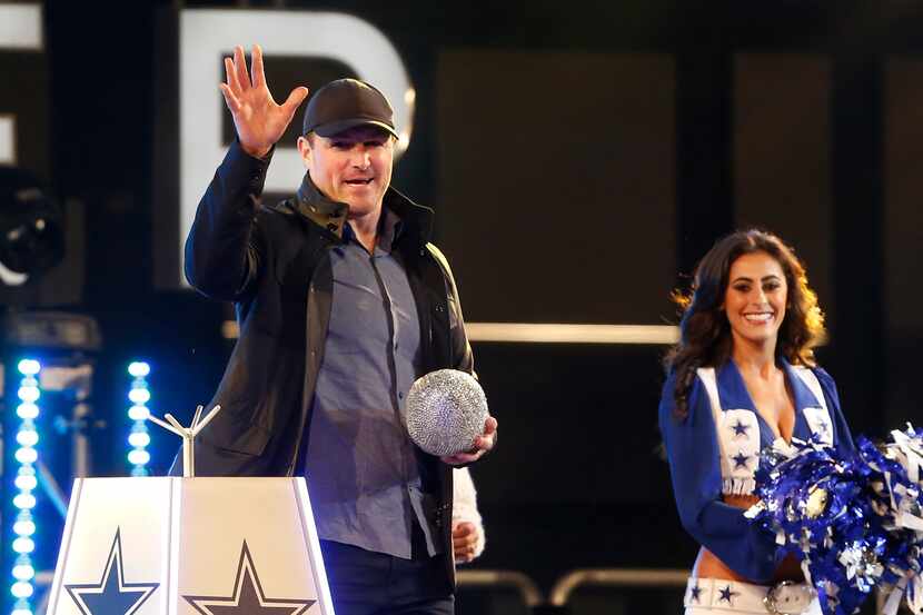 Former Dallas Cowboy Jason Witten waves to the crowd during the celebration of Christmas at...