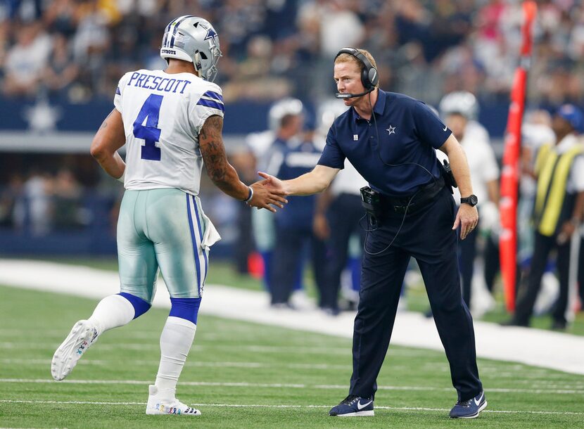 Dallas Cowboys quarterback Dak Prescott (4) and Dallas Cowboys head coach Jason Garrett...