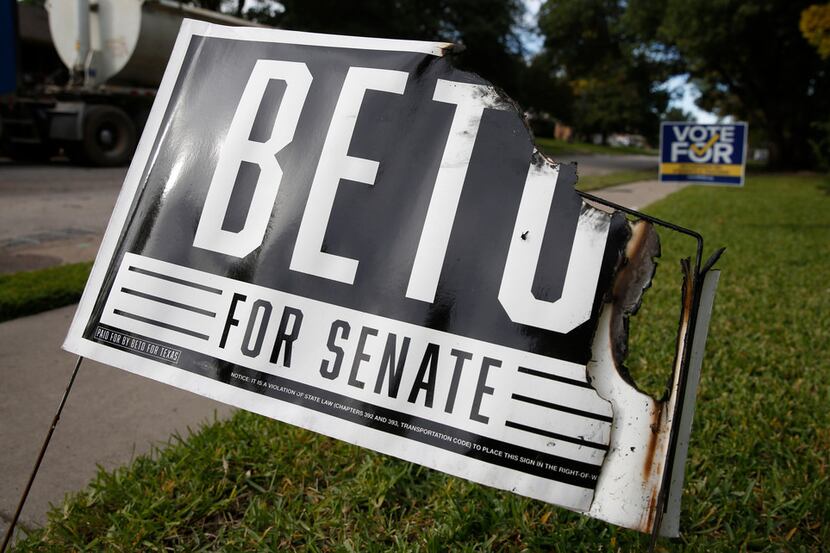 Beto O'Rourke and Colin Allred signs were burned Tuesday night in Richardson.  