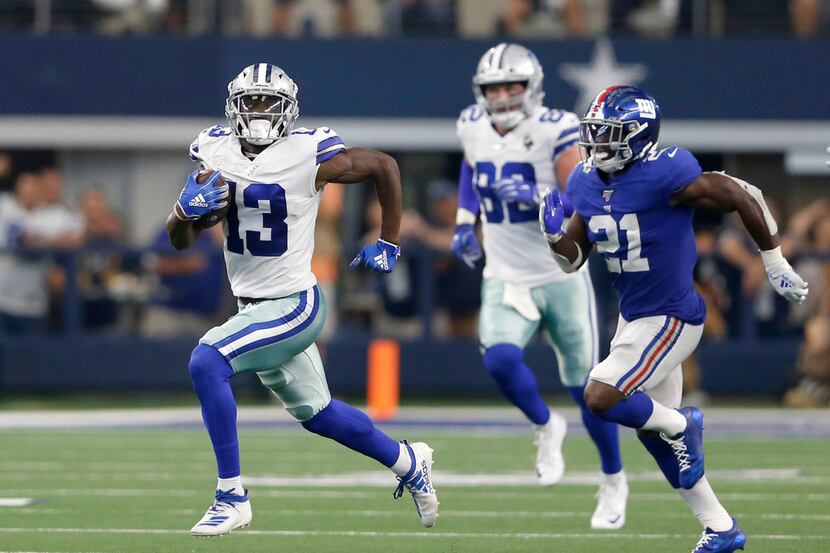 Dallas Cowboys wide receiver Michael Gallup (13) runs up the field after the catch as he is...