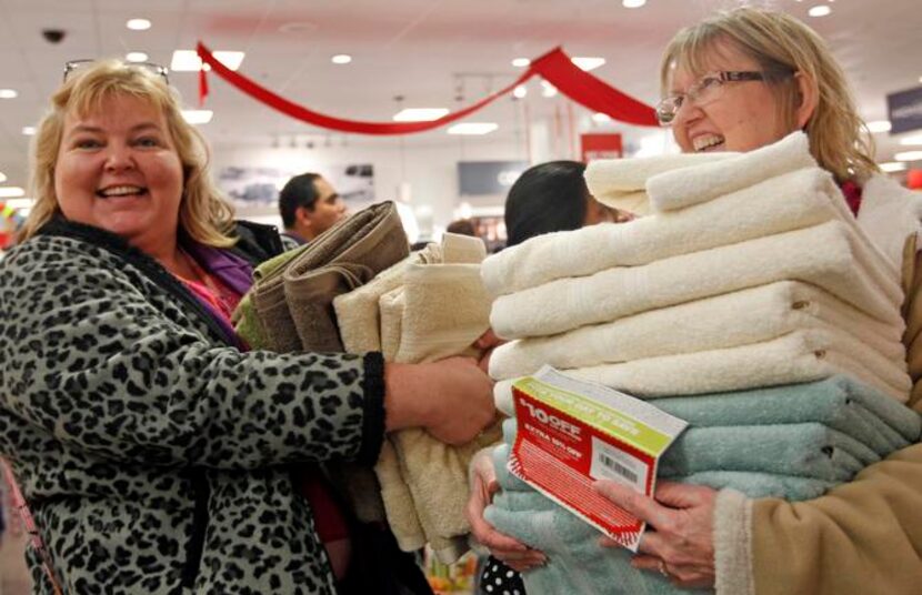 
Karen Redding (left) and Linda Dunn grabbed up $2.99 towels at J.C. Penney in Frisco’s...