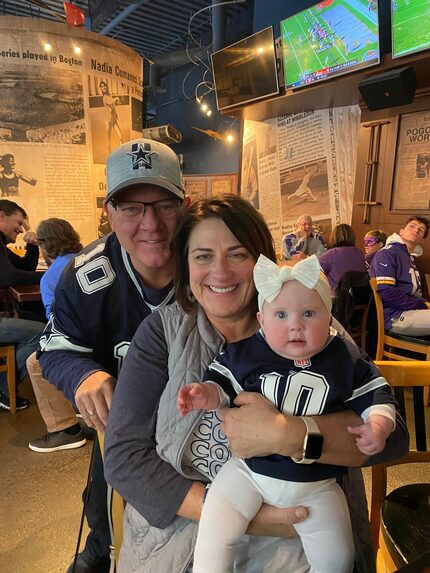 Matt and Fran Rush, Cooper’s parents, with Cooper’s daughter Ayla on Sunday, Oct. 31, 2021.