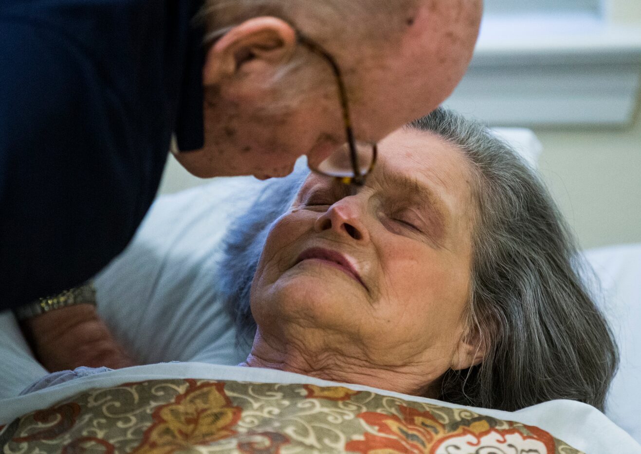 Bob Stiegler leans in to kiss his wife, Norma.