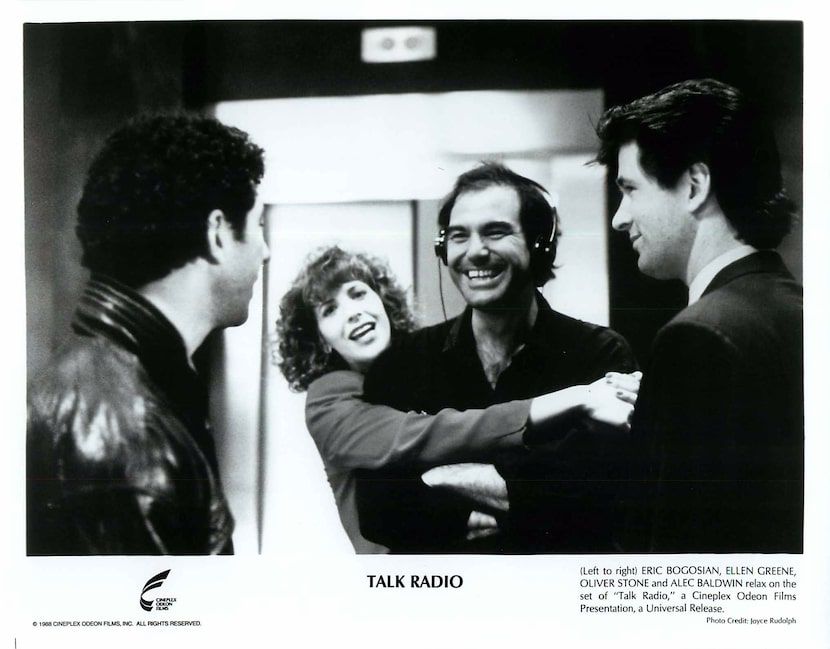 Director Oliver Stone (with headphones) hangs with the cast of "Talk Radio," (from left)...