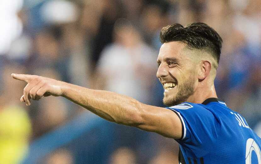 Montreal Impact's Alejandro Silva reacts after scoring against Sporting Kansas City during...