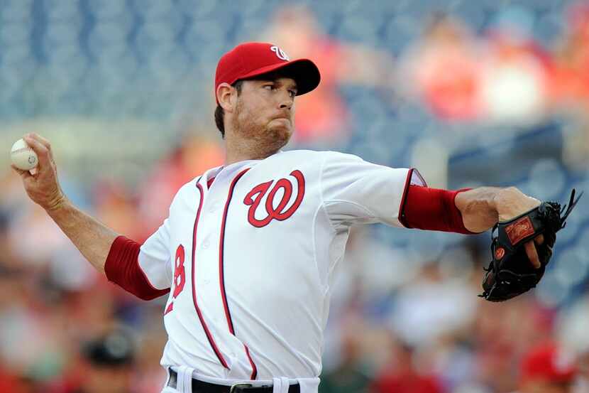 WASHINGTON, DC - JULY 06:  Doug Fister #58 of the Washington Nationals pitches in the first...