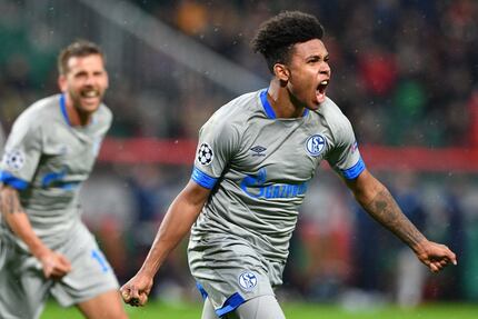 Schalke's US midfielder Weston McKennie celebrates after scoring a goal during the UEFA...