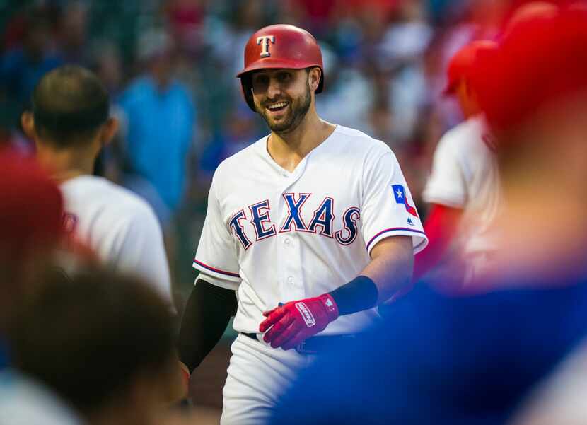 Texas Rangers out fielder Joey Gallo (13) celebrates a home run hit during the second inning...