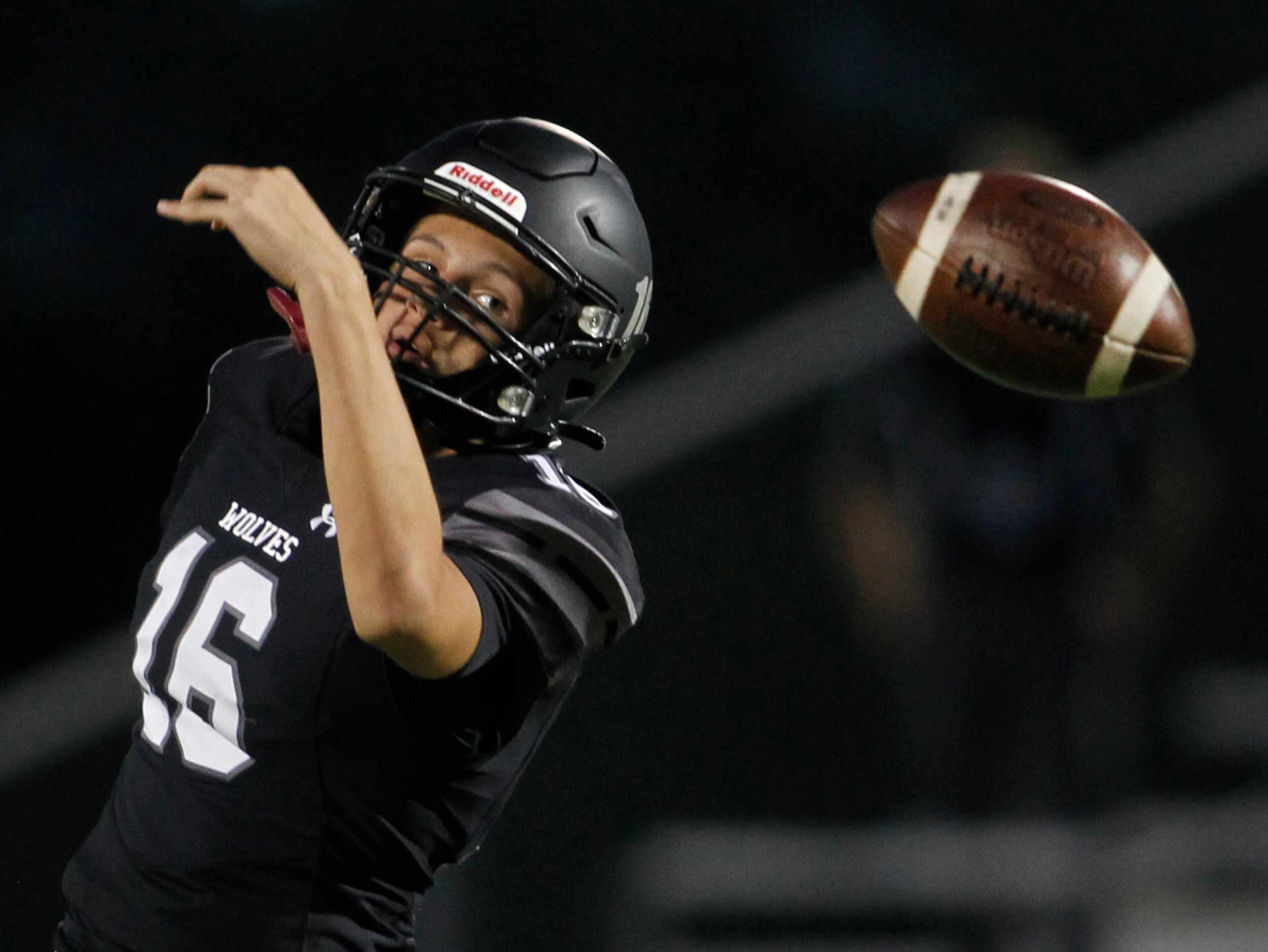 Mansfield Timberview punter Tyler Strumila (16) eyes the ball after an errant snap sailed...