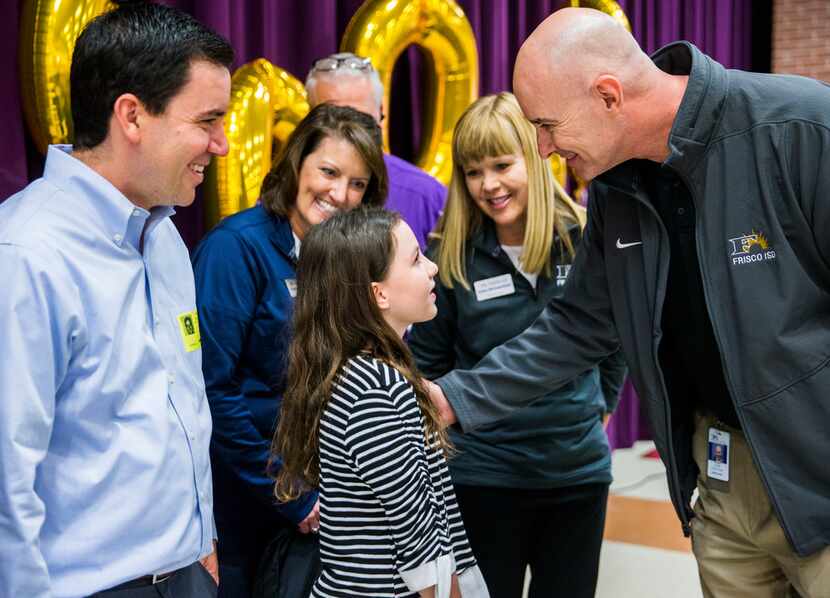 Sixth-grader Alanna Mazeffa, 11, talked to Frisco ISD Superintendent Mike Waldrip after she...
