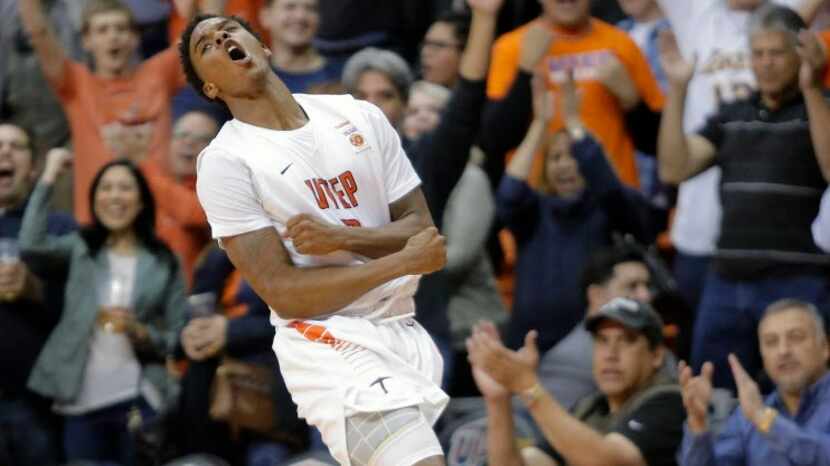 UTEP guard Omega Harris celebrates after hitting a three pointer during an NCAA college...