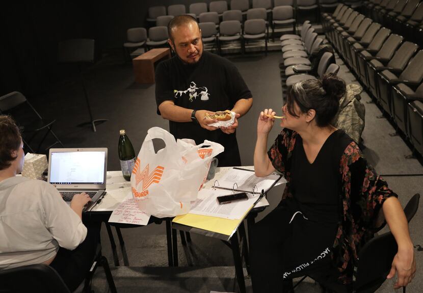 From left, Alex Alpharaoh and Brisa Areli Munoz take time for Whataburger during a rehearsal...