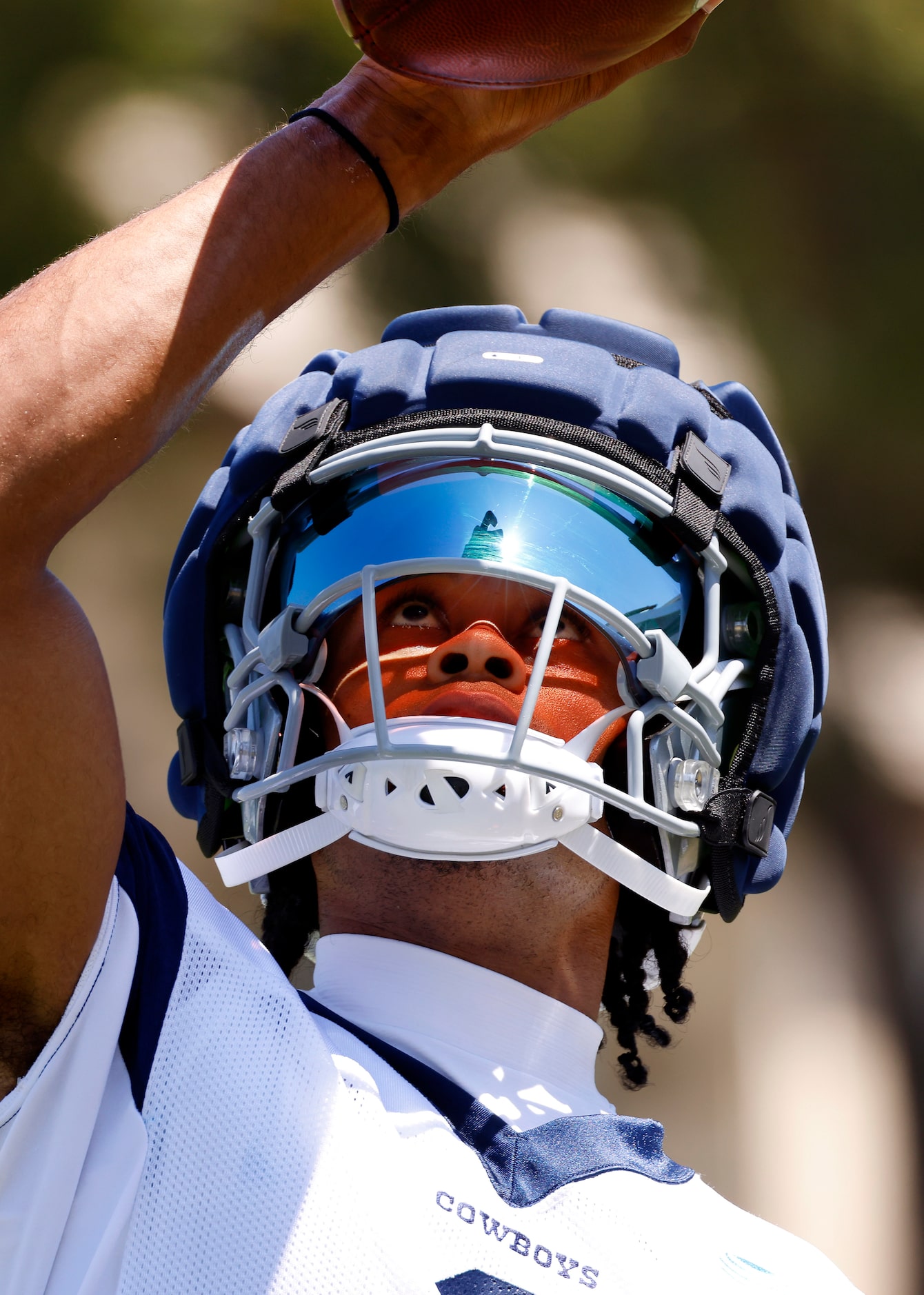 Dallas Cowboys wide receiver Jalen Tolbert (1) catches a one-handed pass as he looks through...