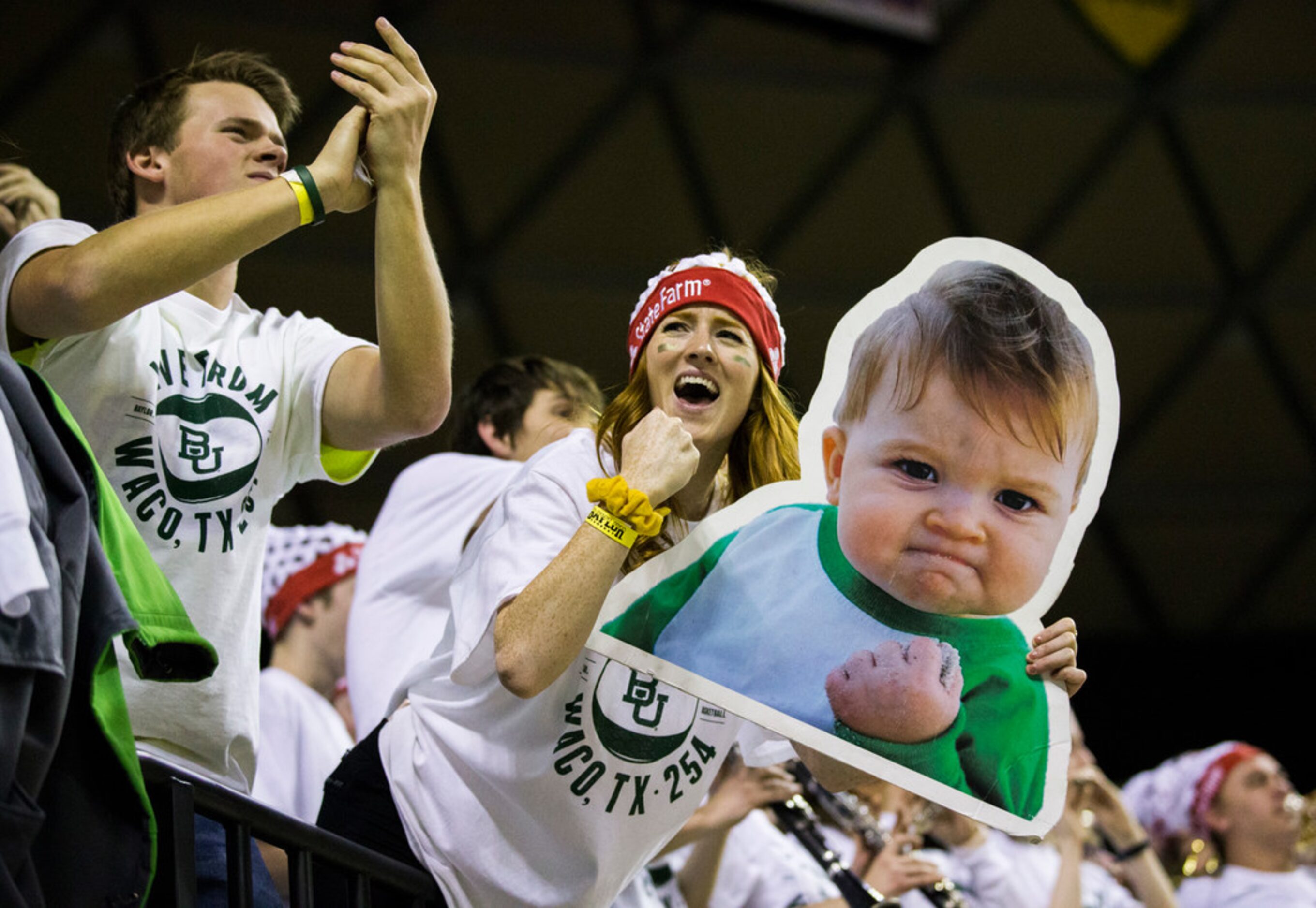 Baylor Bears fans cheer during the first half of an NCAA men's basketball game between...