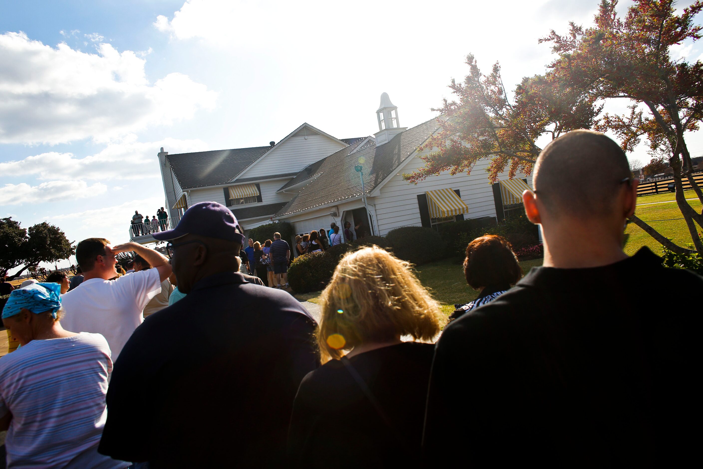 A long line of fans of the television show, Dallas, and those present to pay their respects...