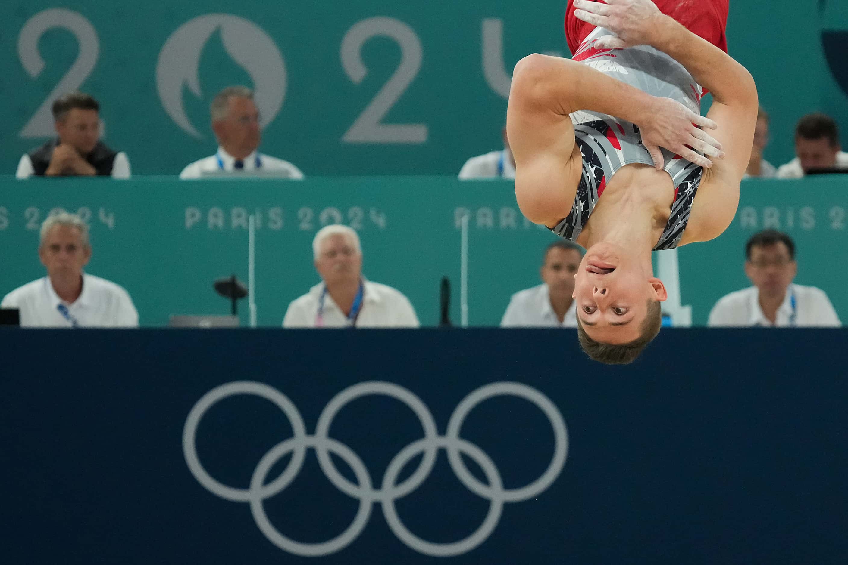 Paul Juda  of the United States competes on the floor during the men’s gymnastics team final...