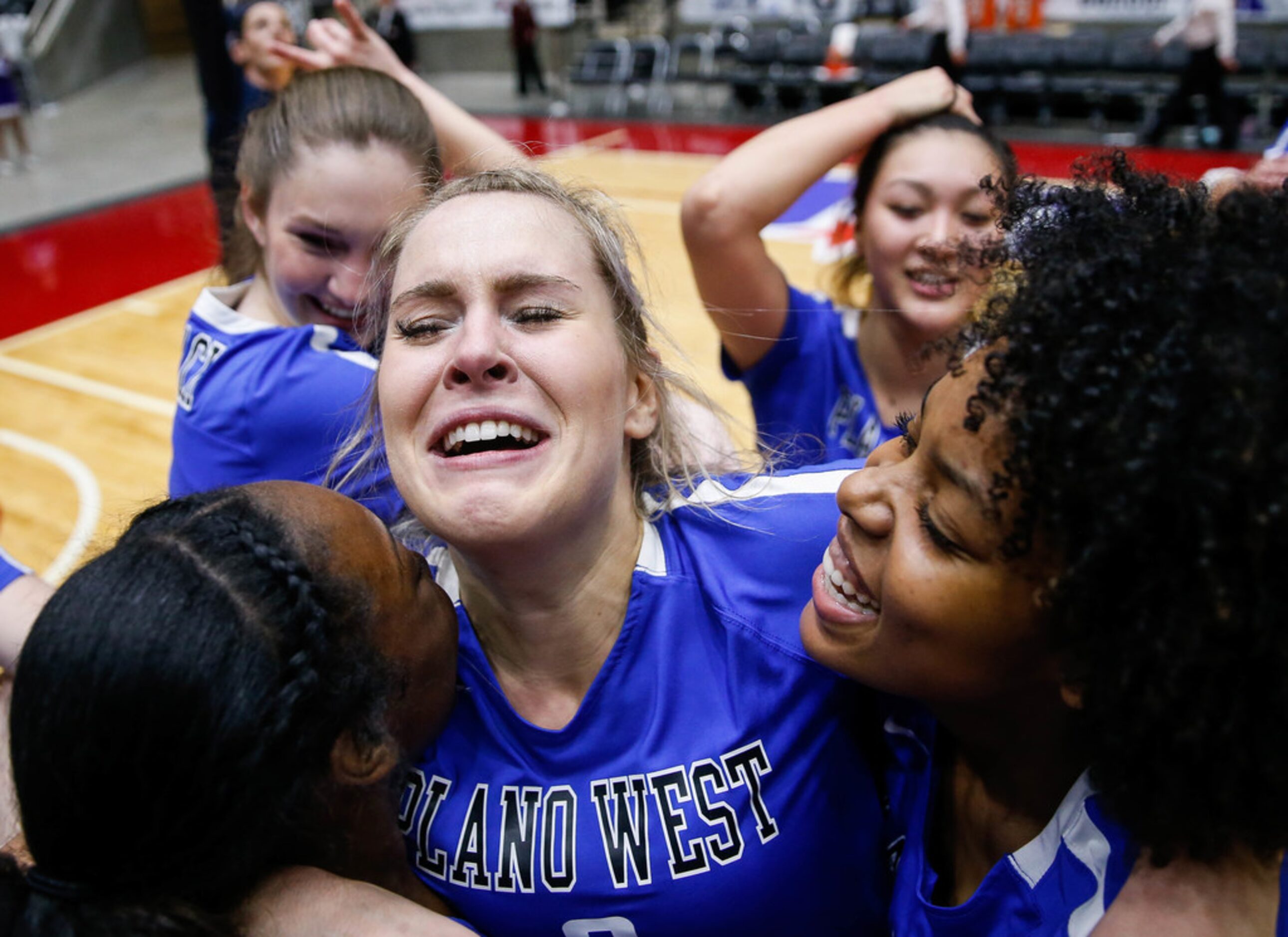 Plano WestÃs Noelle Piatas (6) celebrates with her team after winning the fifth and final...