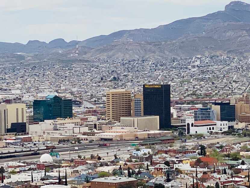 Downtown El Paso with Juarez in the background. How the cities deal with the threat of...