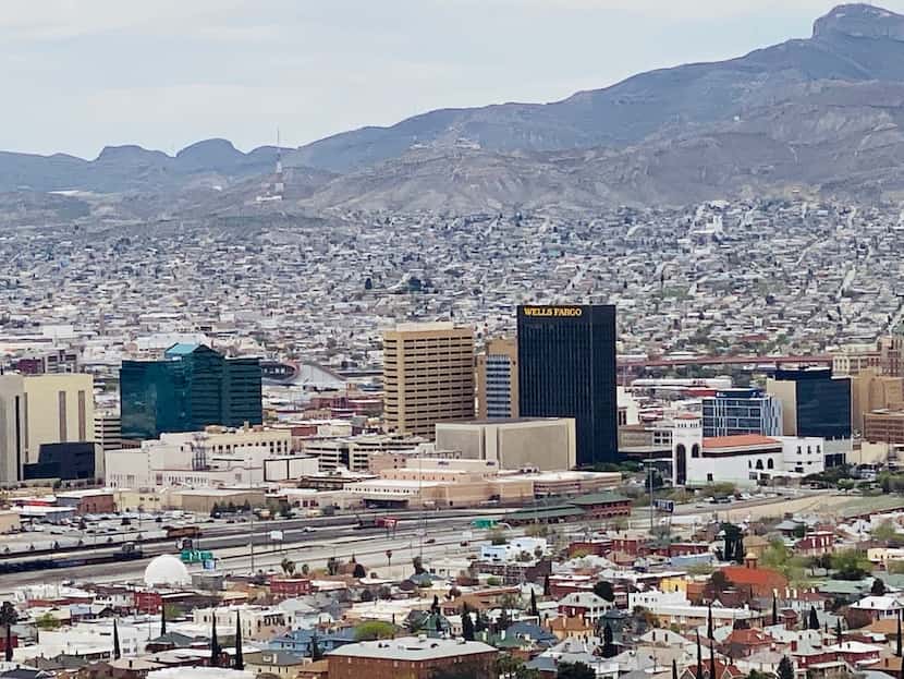 Downtown El Paso with Juarez in the background. How the cities deal with the threat of...