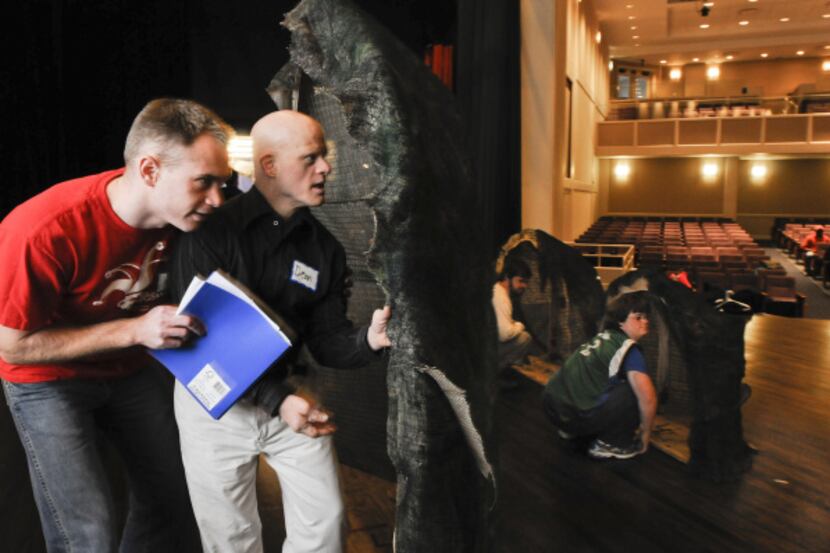 Jesters volunteer Eric Richards, left, helps Dean Leffler, portraying a squirrel, rehearse a...