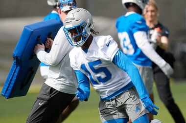 Detroit Lions cornerback Ennis Rakestraw Jr. performs during a drill during an NFL rookie...