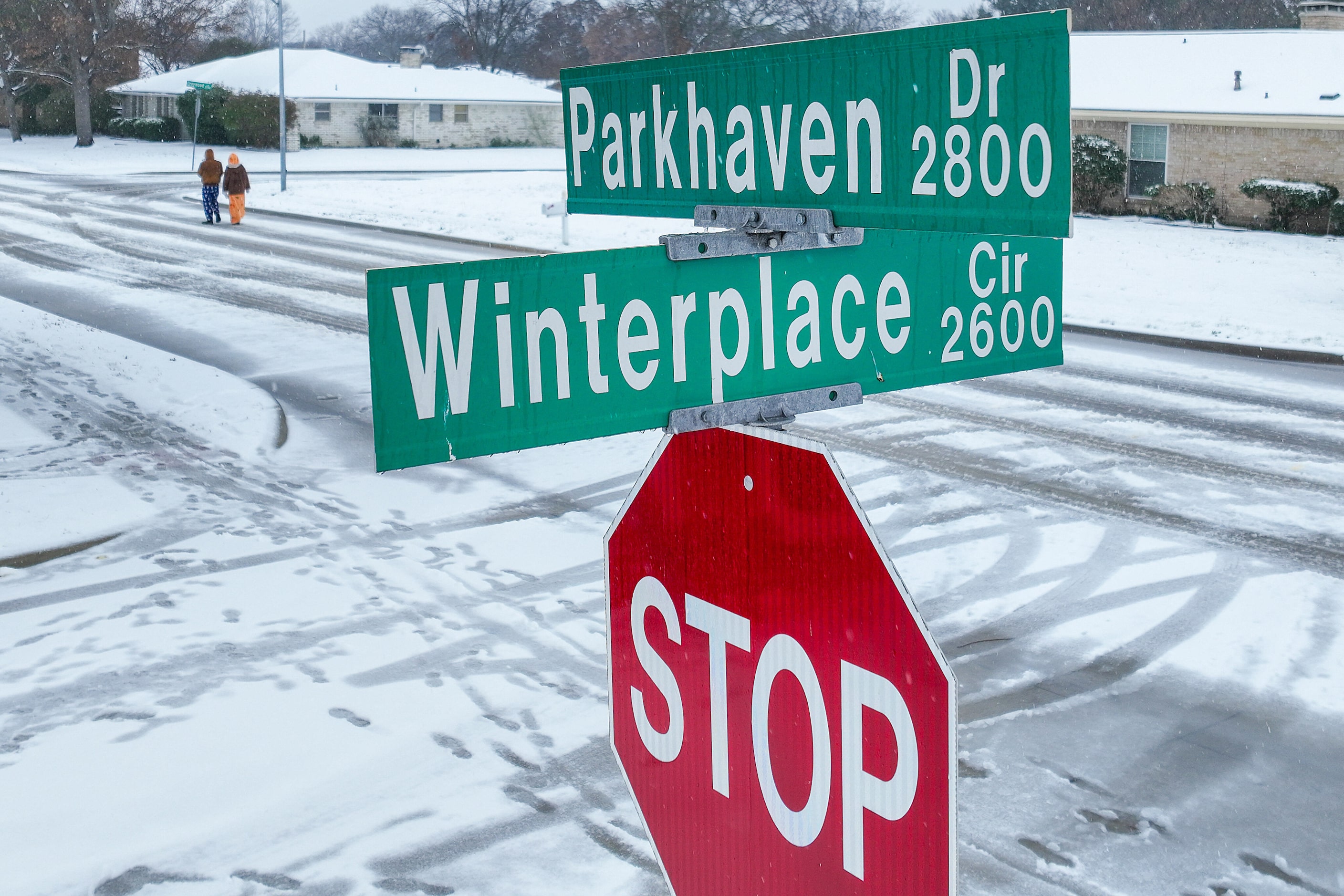 Snow falls on Winterplace Circle on Thursday, Jan. 9, 2025, in Plano.  A winter storm is...