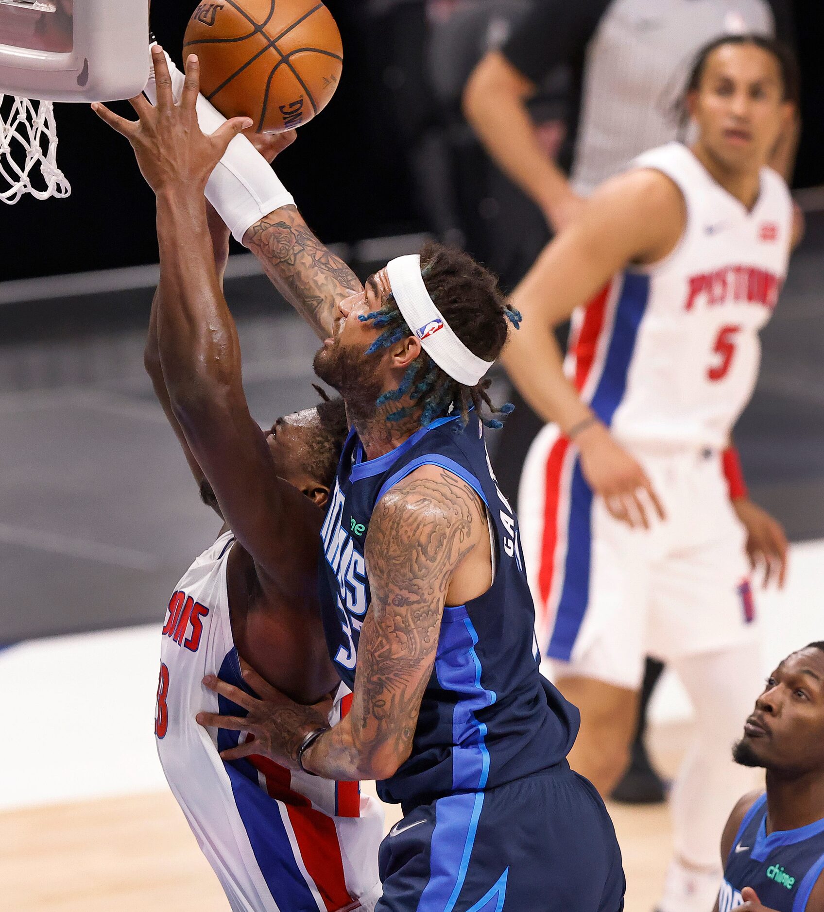 Dallas Mavericks center Willie Cauley-Stein (33) fouls Detroit Pistons guard Cory Joseph...