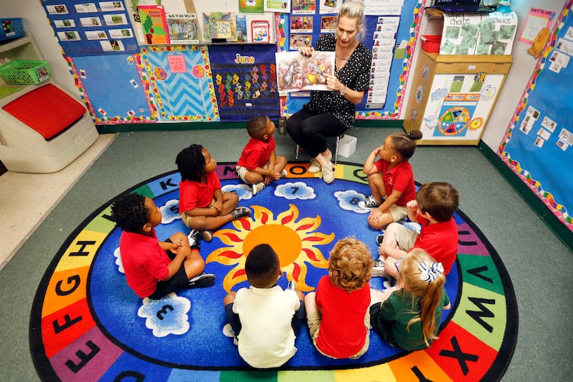 Three-year-old children at CP Preparatory School in Mesquite gather and listen to instructor...